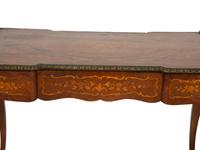 A Louis XV Style Brass Mounted Marquetry Writing Desk