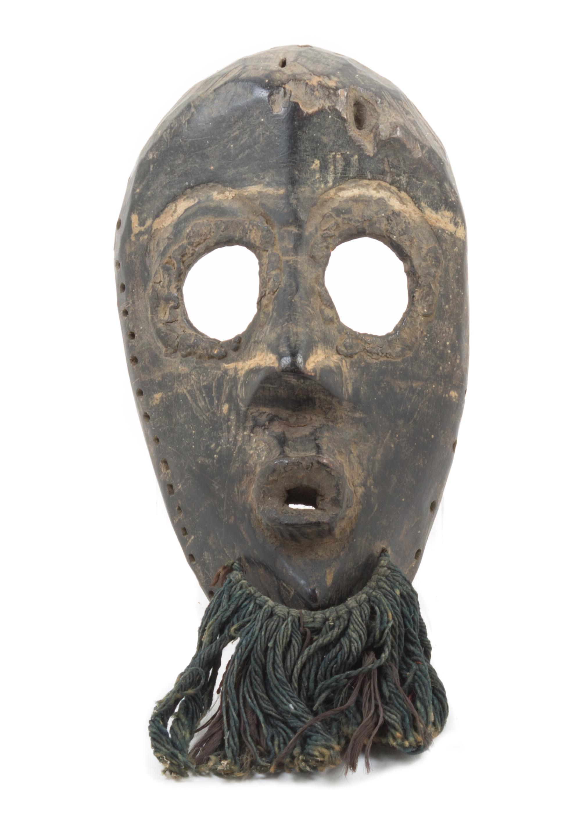 A Dan Poro Society Wood Mask Height 11 inches. — LIBERIA/IVORY COAST, 19TH/20TH CENTURY
