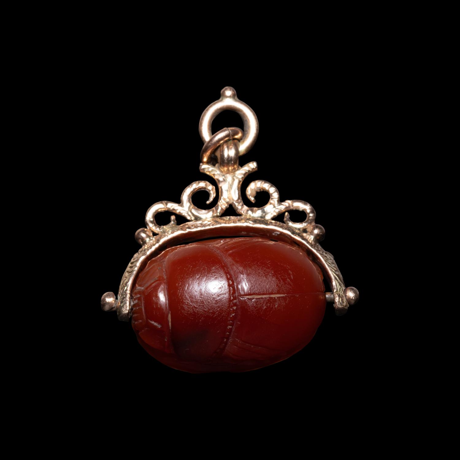 An Etruscan Carnelian Scarab with Warrior on Horseback and a Griffin — Set in a 19th Century gold swivel fob