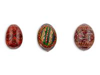 A Kashmiri Lacquer Box and Seven Lacquer Eggs