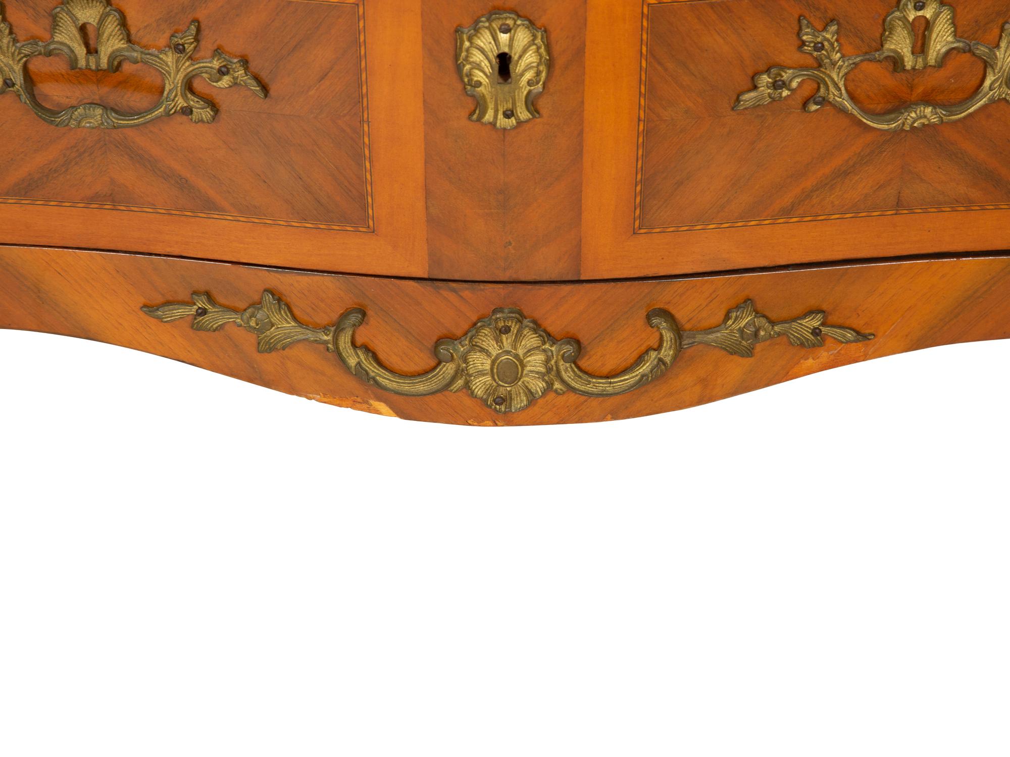 A Pair of Louis XV Style Gilt Metal Mounted Bookmatch Veneered Marble-Top Commodes