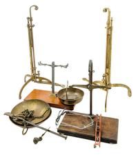A Collection of Balance Scale Parts Height of tallest 27 1/4 inches.