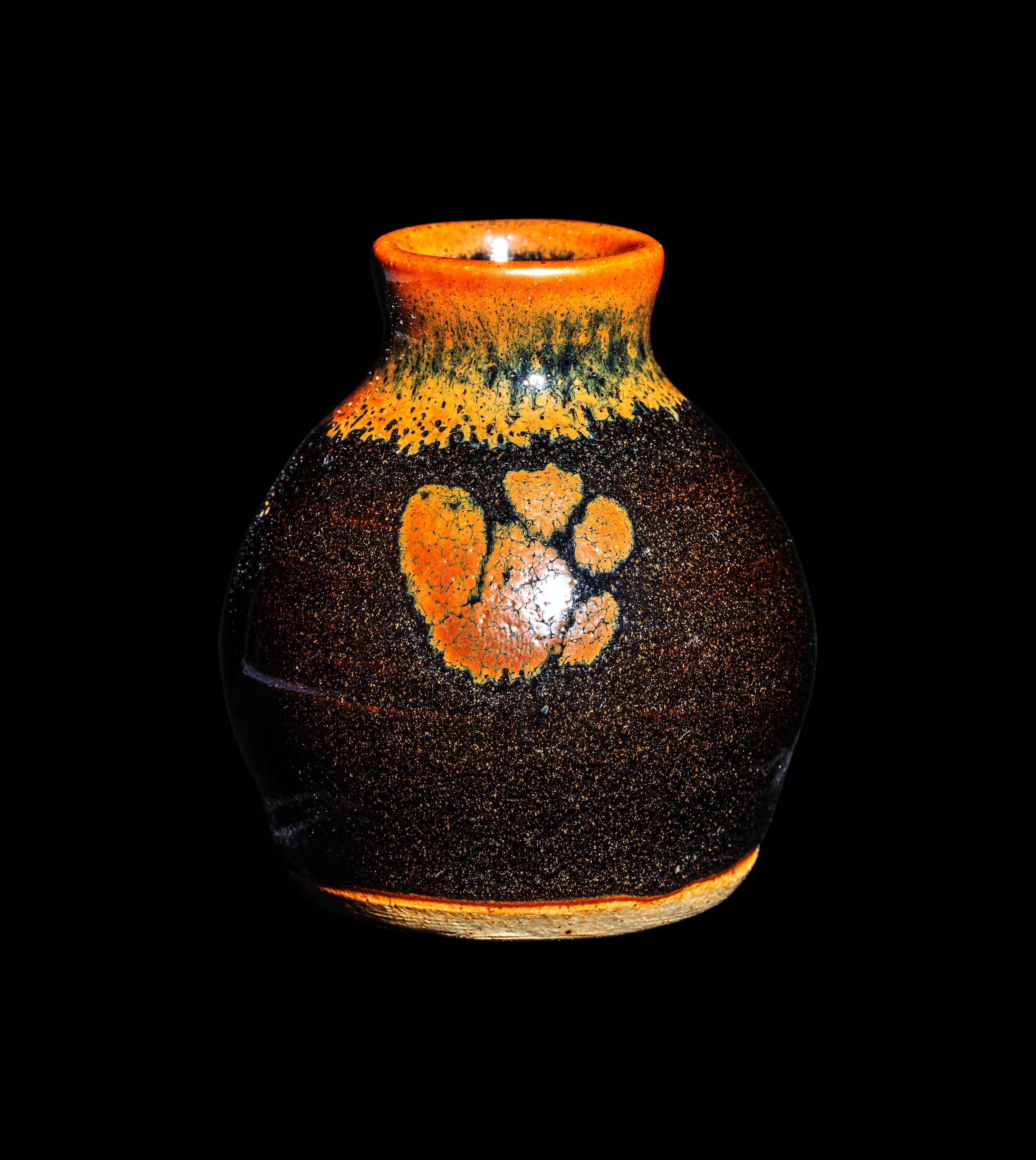 A Small Dark Brown Glazed Stoneware Jar