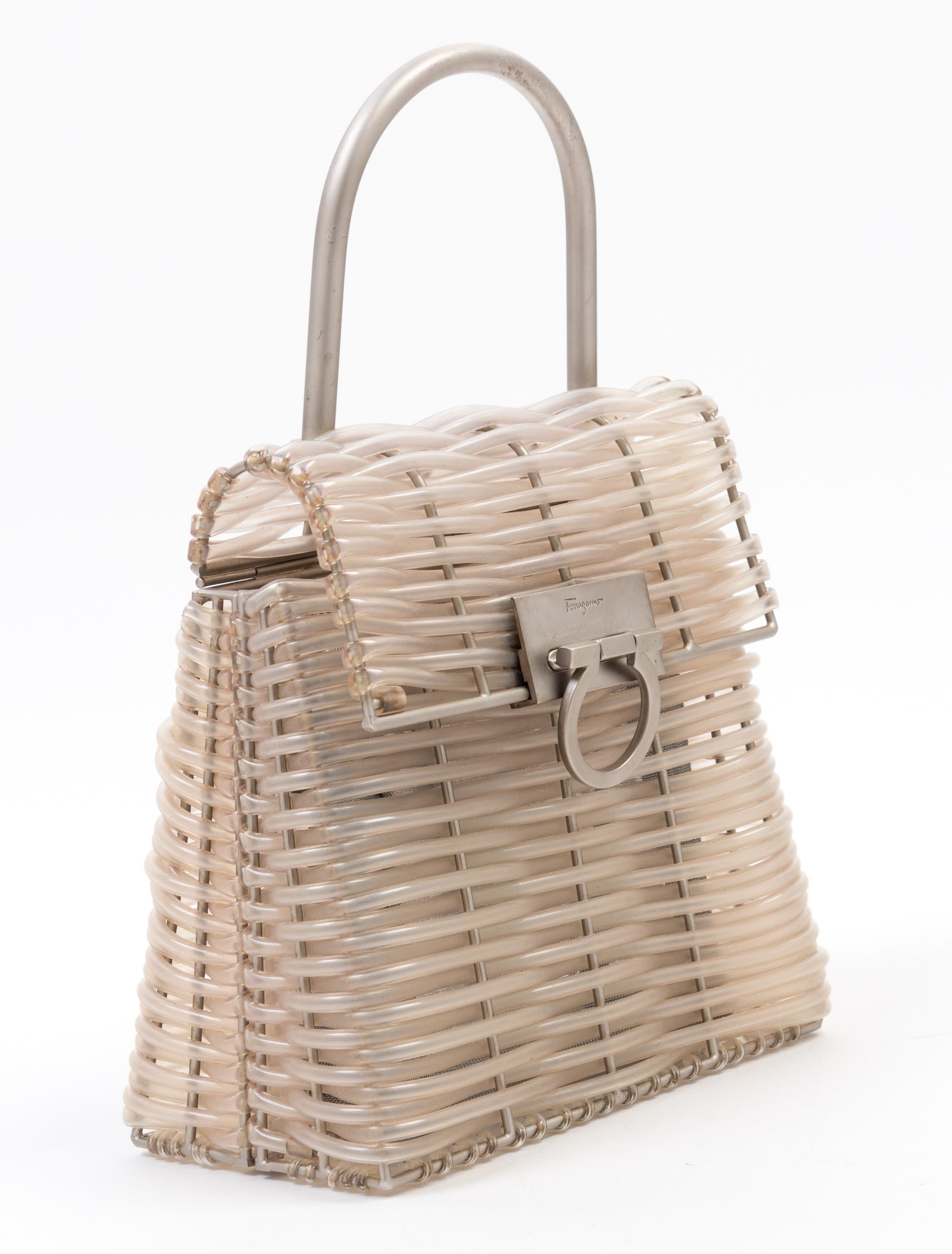 A Salvatore Ferragamo Gancini Plastic Weave Handbag, 8" x 8" x 4.5"; Handle drop: 4".