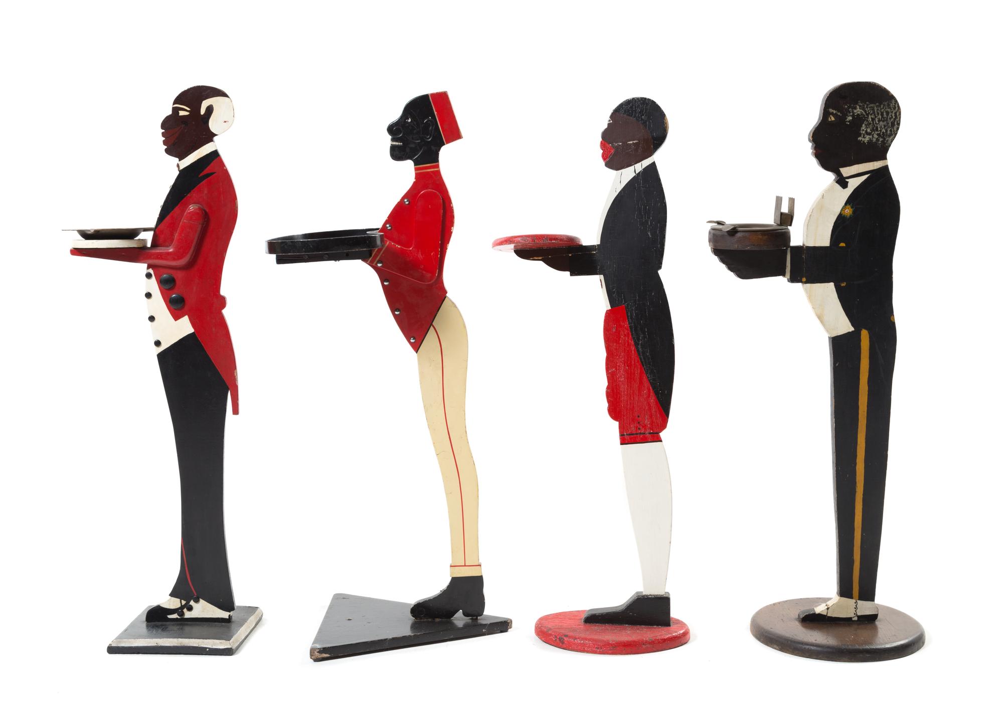 Four Standing African American Tip Trays Height of tallest 35 inches. — Mid 20th Century