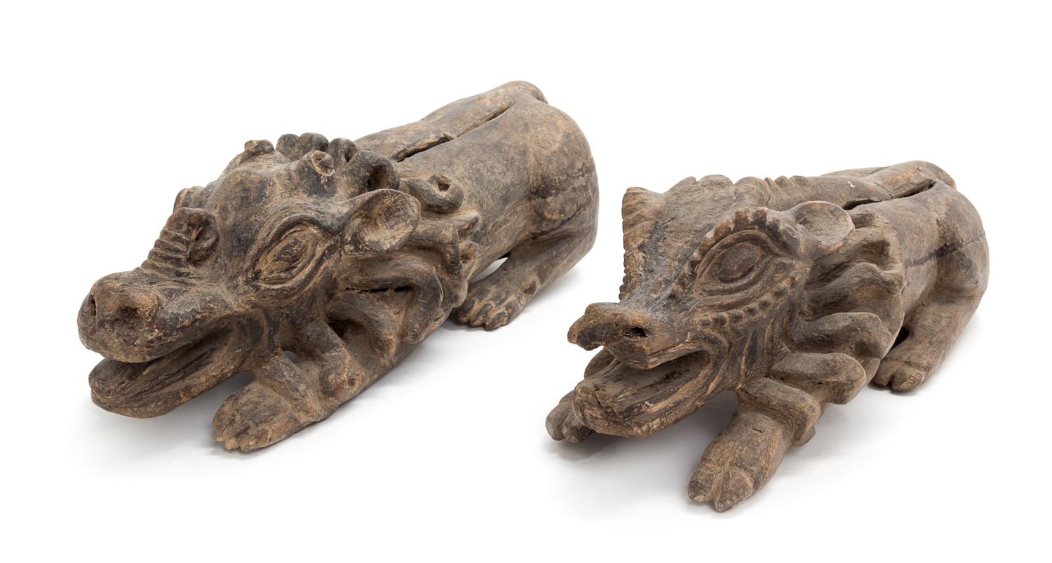 A Pair of Carved Wood Animal Figures Length of larger 20 inches.