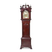 A Colonial Revival Carved Oak Tall Case Clock