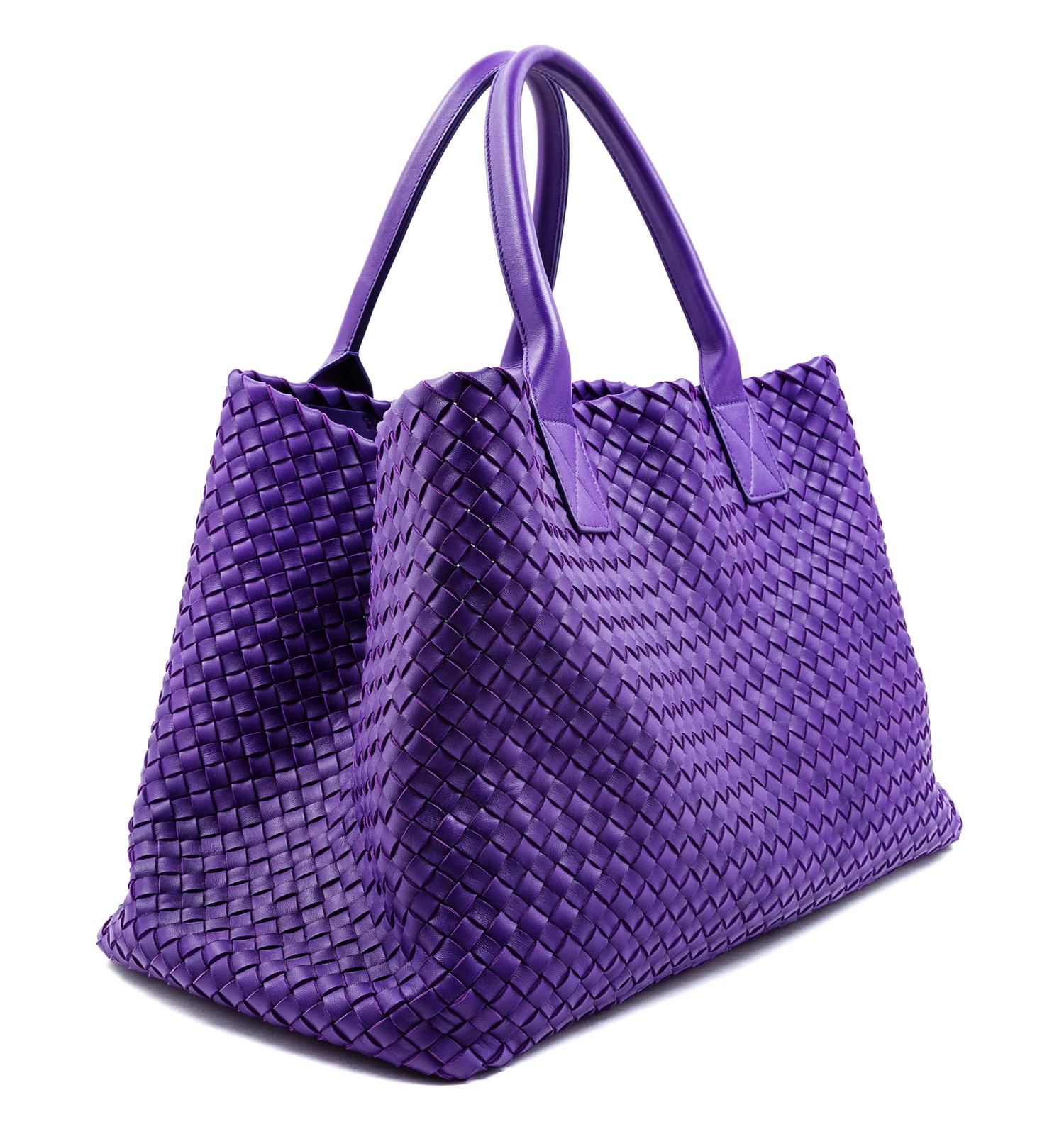 A Bottega Veneta Purple Intrecciato Leather Tote, 11.25" H x 19.5" W x 9" D; Handle drop: 7"; Pouch: 6.25" x 10.5".