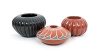 Three Santa Clara Jars First height 3 x diameter 5 1/4 inches.