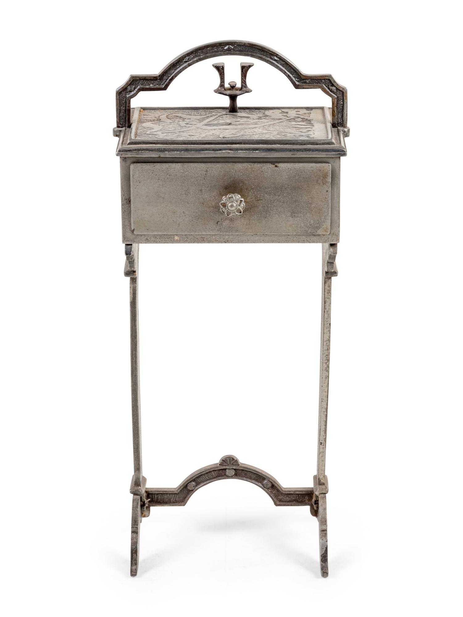 An Art Deco Silvered Metal Smoker's Table