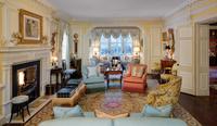 A Pair of George III Gilt Bronze Mounted Tulipwood, Burr Yew and Satinwood Marquetry Demilune Cabinets