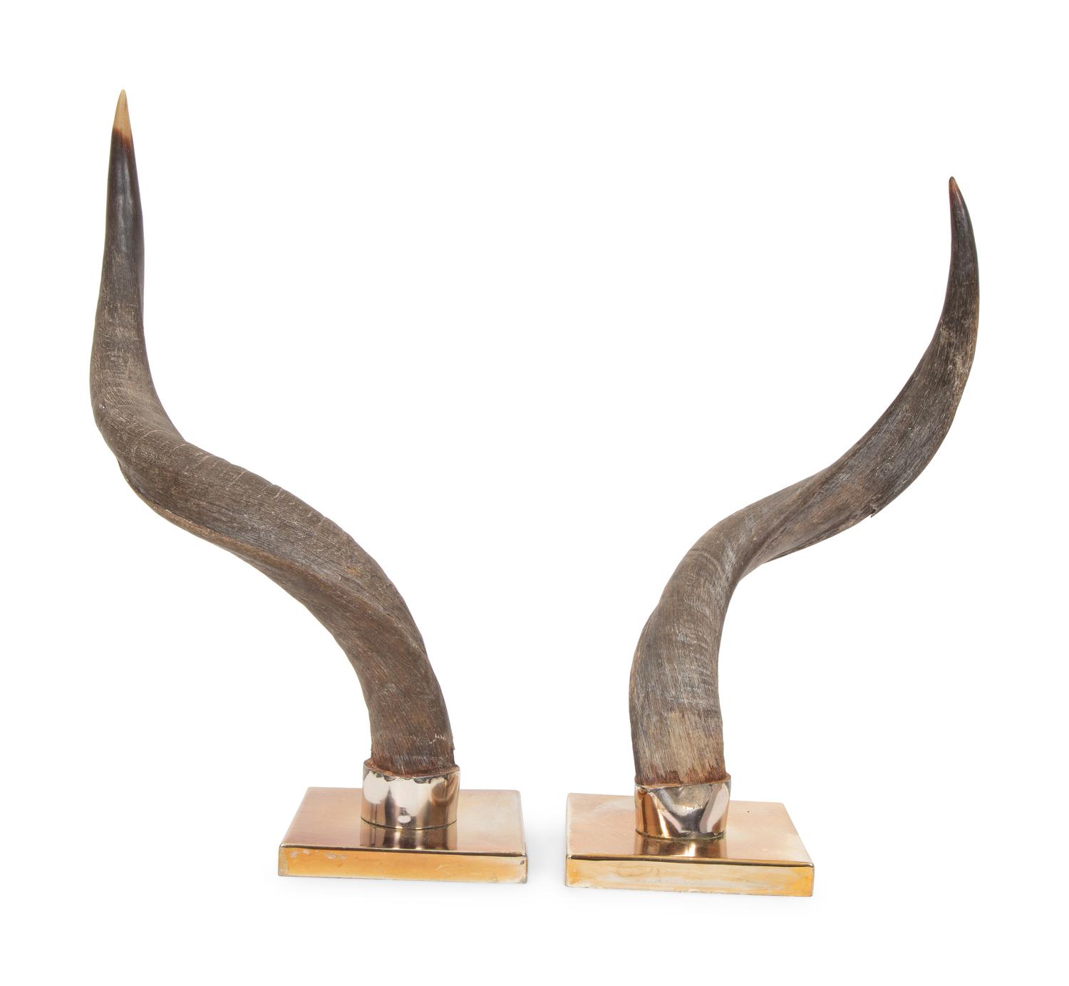 A Pair of Anthony Redmile Impala Horns Mounted on Bronzed Metal Bases
