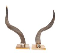 A Pair of Anthony Redmile Impala Horns Mounted on Bronzed Metal Bases