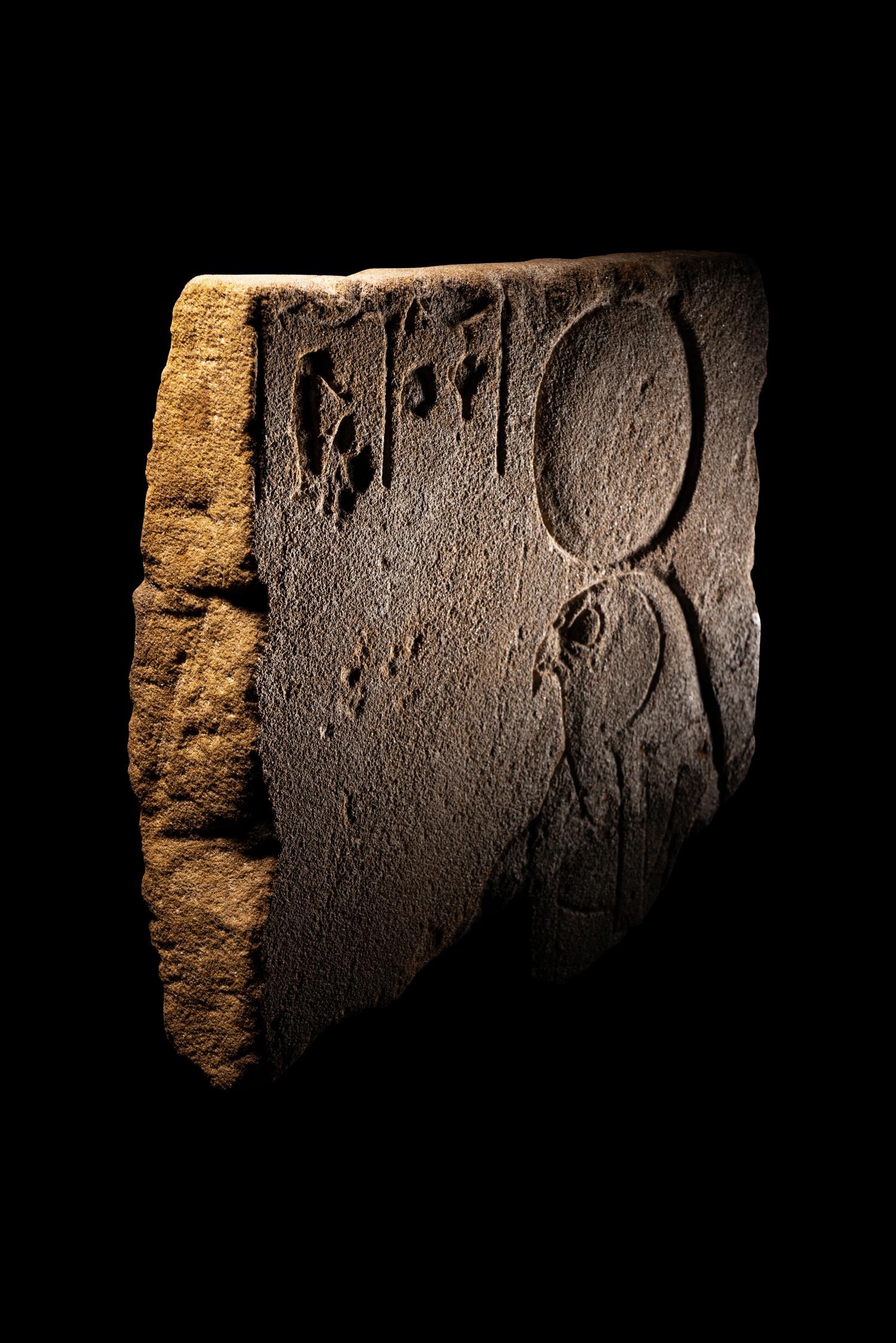 An Egyptian Sandstone Relief of Horus