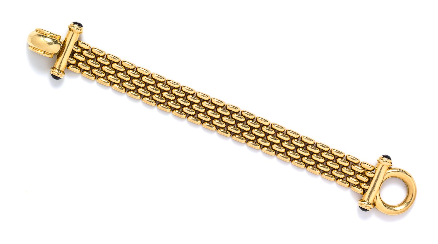 A 14 Karat Yellow Gold and Sapphire Panther Link Bracelet, 28.3 dwts.