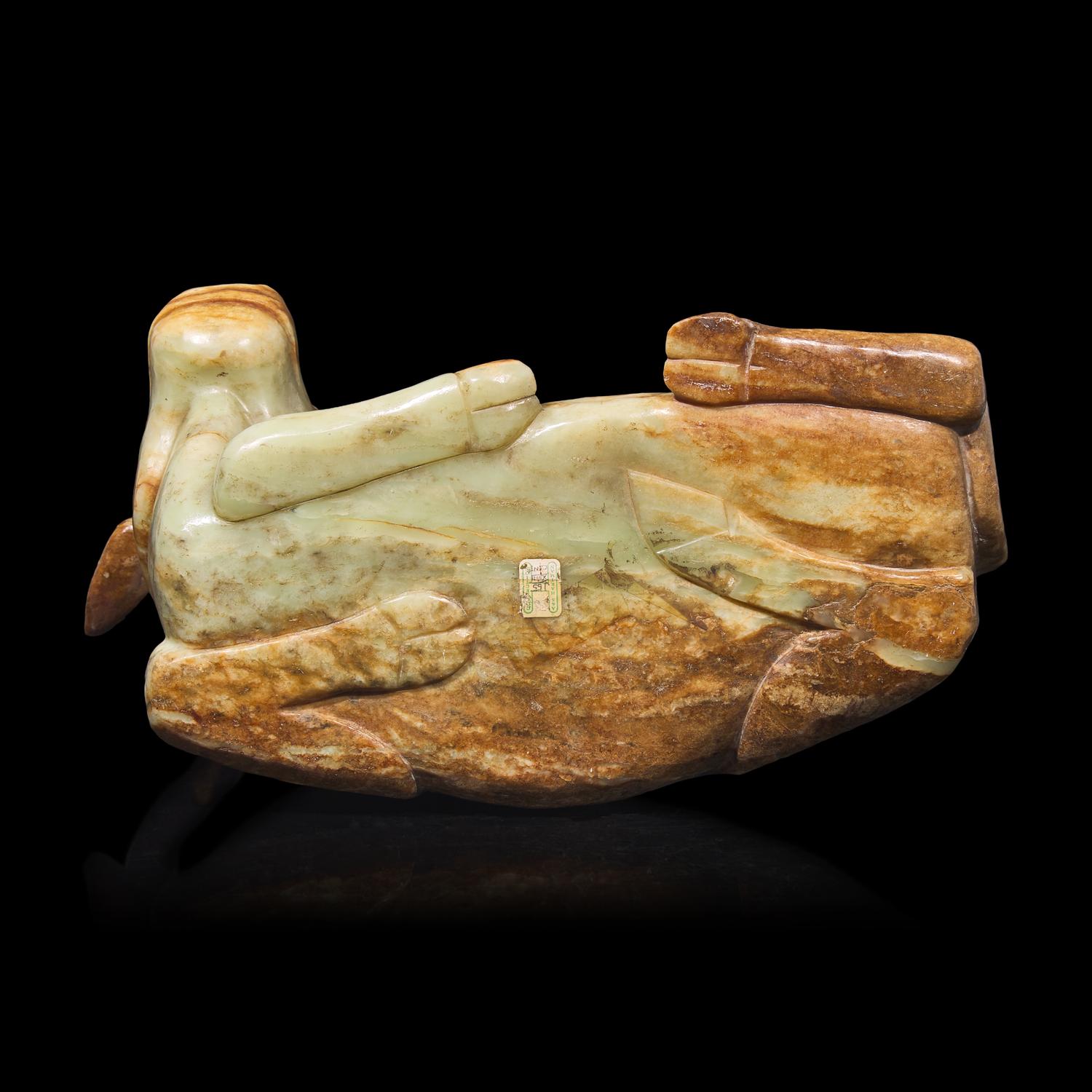 A Large Chinese Celadon and Beige Jade Buffalo, 18th/19th Century 清中期 青玉臥牛