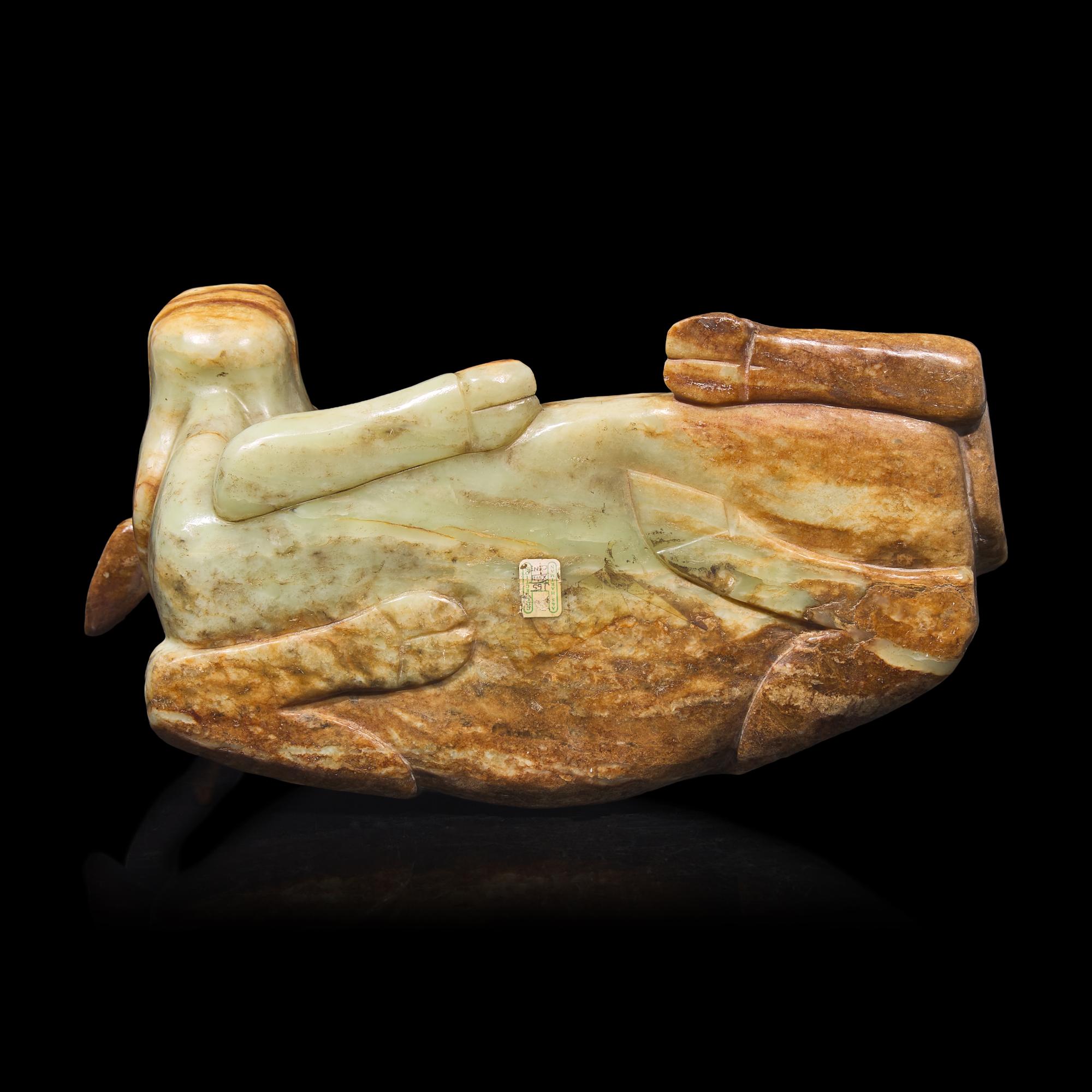 A Large Chinese Celadon and Beige Jade Buffalo, 18th/19th Century 清中期 青玉臥牛