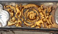 A Baroque Verre Eglomise Mirror