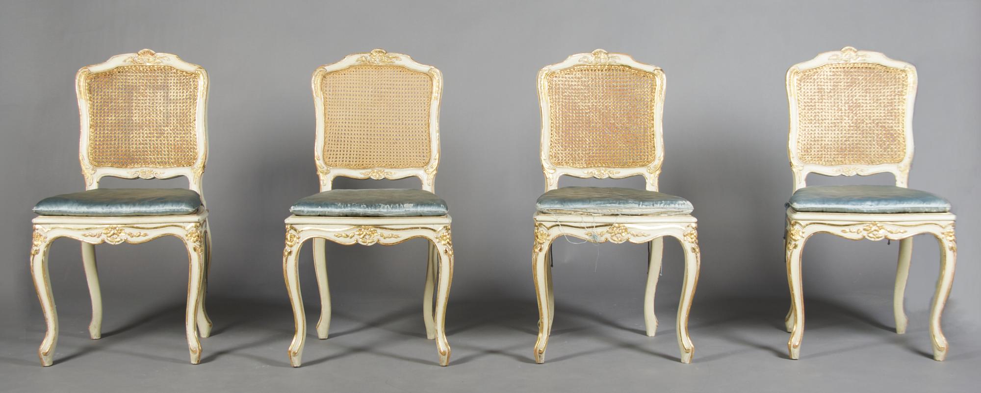 A Set of Four Louis XV Style Painted and Parcel Gilt Chairs, Height 36 1/2 inches.