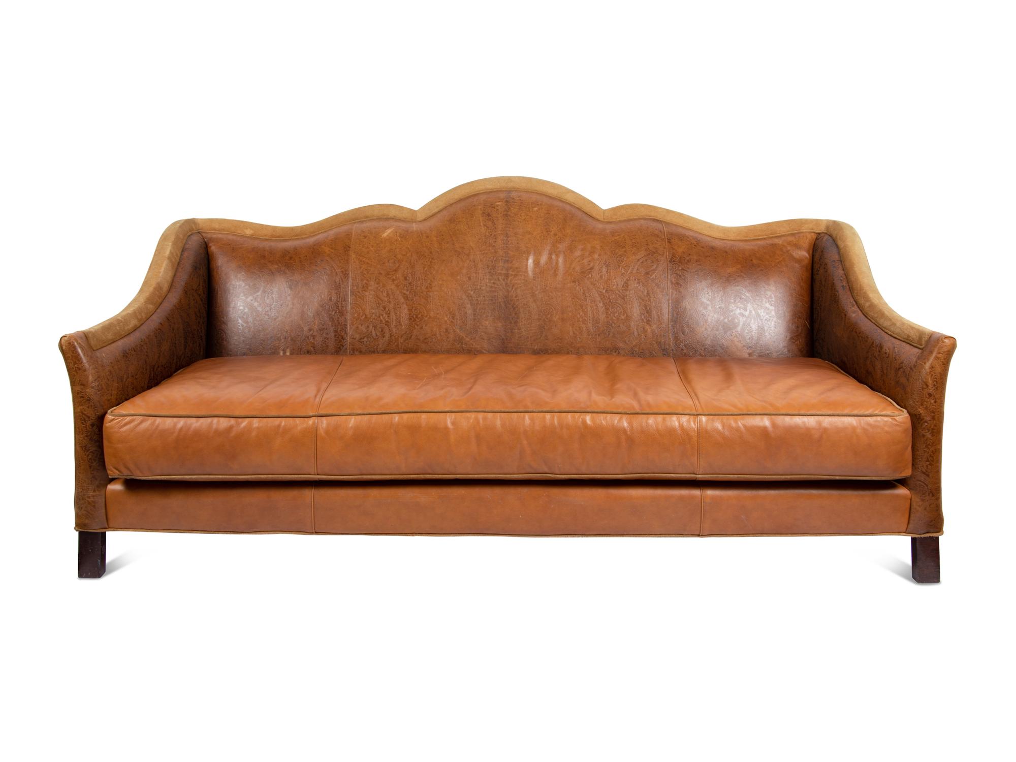 A Custom Leather Upholstered Camelback Sofa