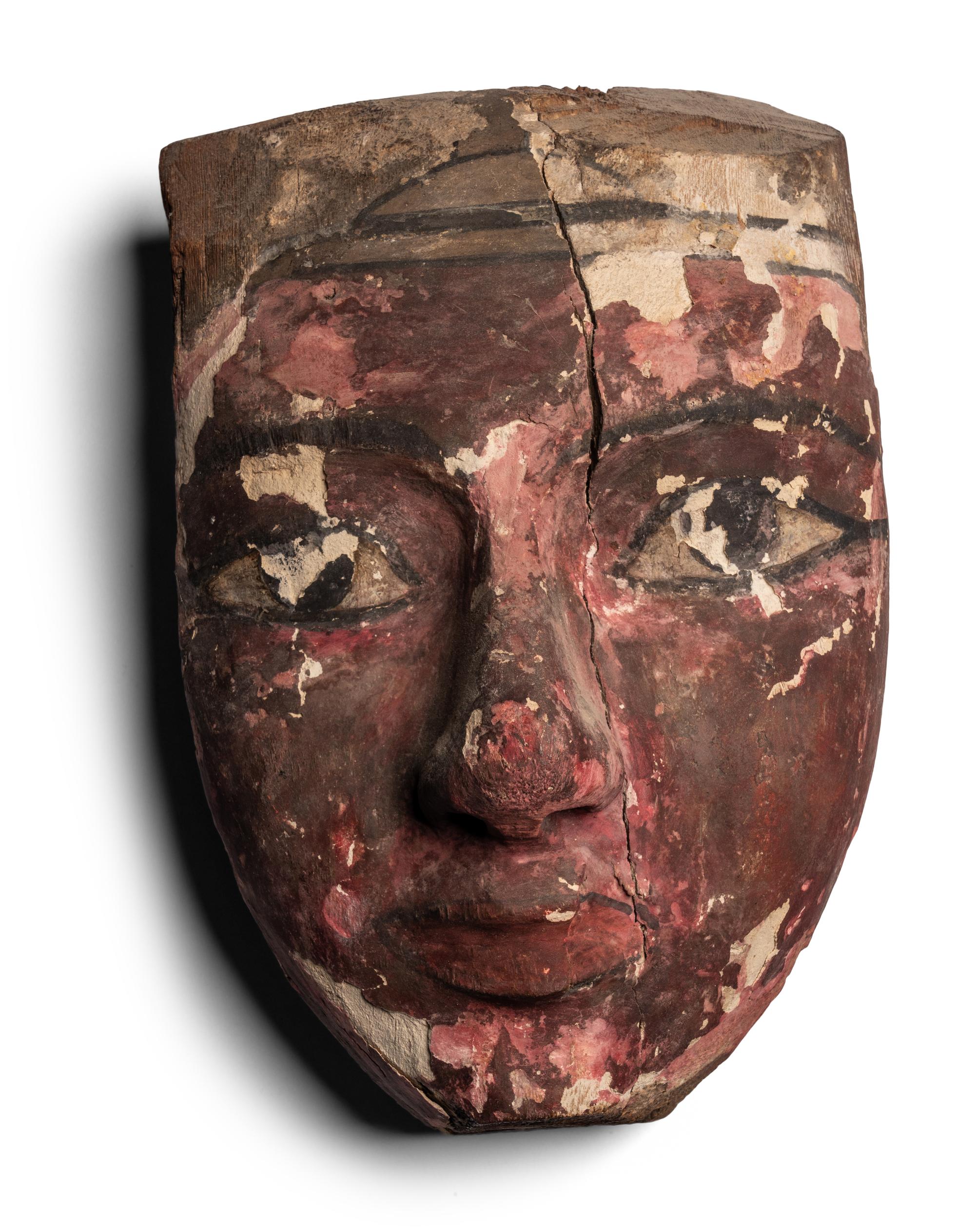 An Egyptian Painted Wood Mummy Mask