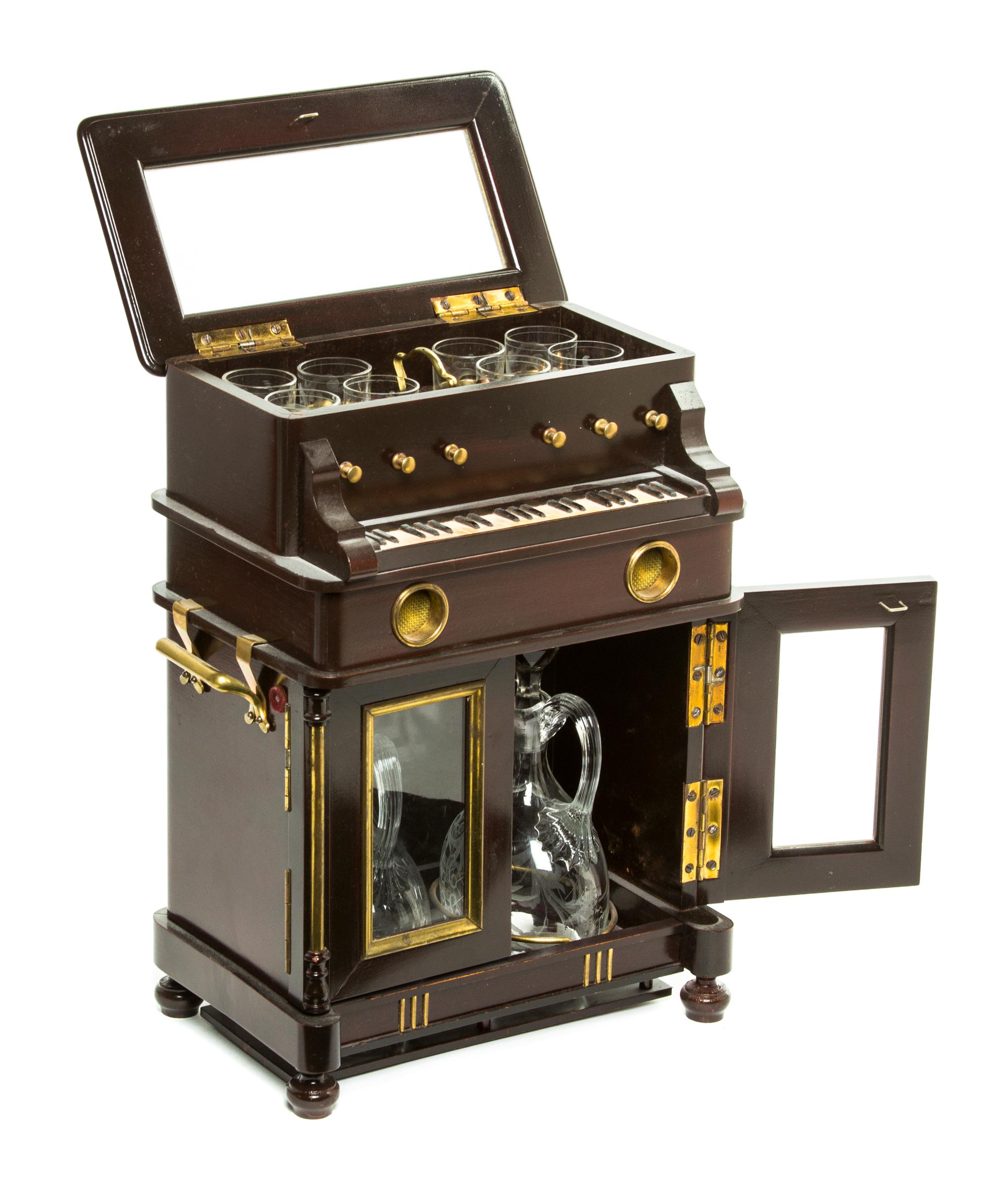 A Musical Cave a Liqueur Set, Height 12 inches.