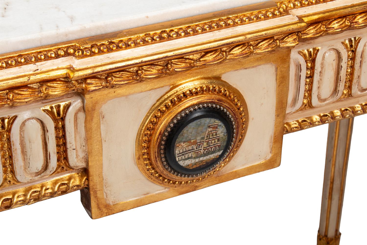 A Pair of Italian Neoclassical Style Cream-Painted, Parcel Gilt and Micro Mosaic Plaque-Mounted Console Tables