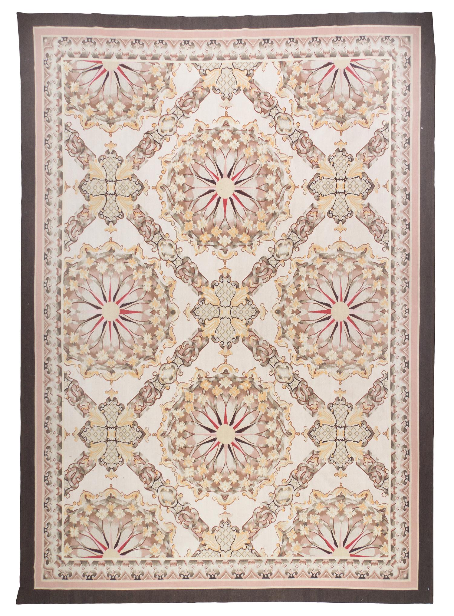 An Aubusson Wool Rug, 12 feet x 9 feet.