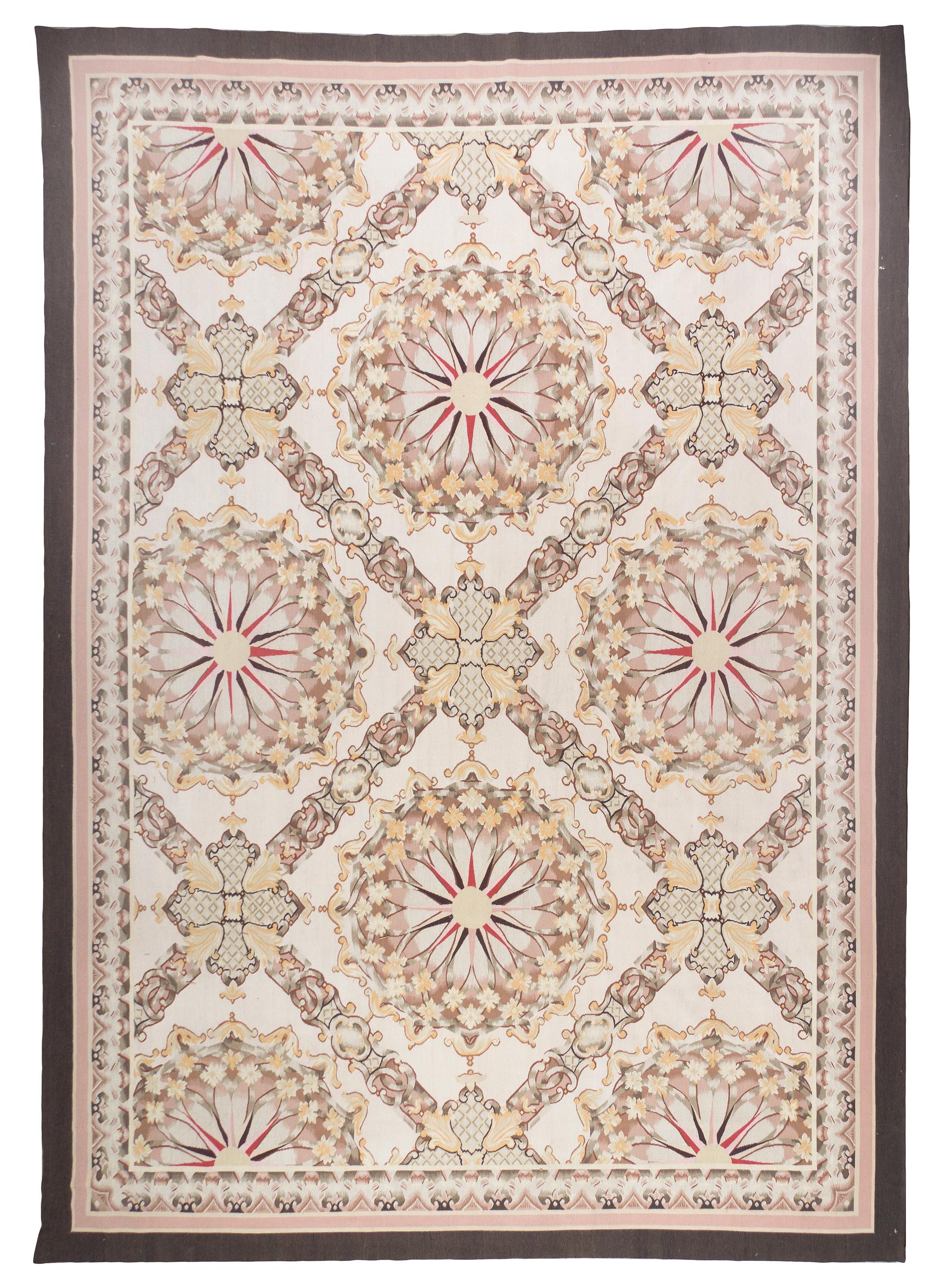 An Aubusson Wool Rug, 12 feet x 9 feet.
