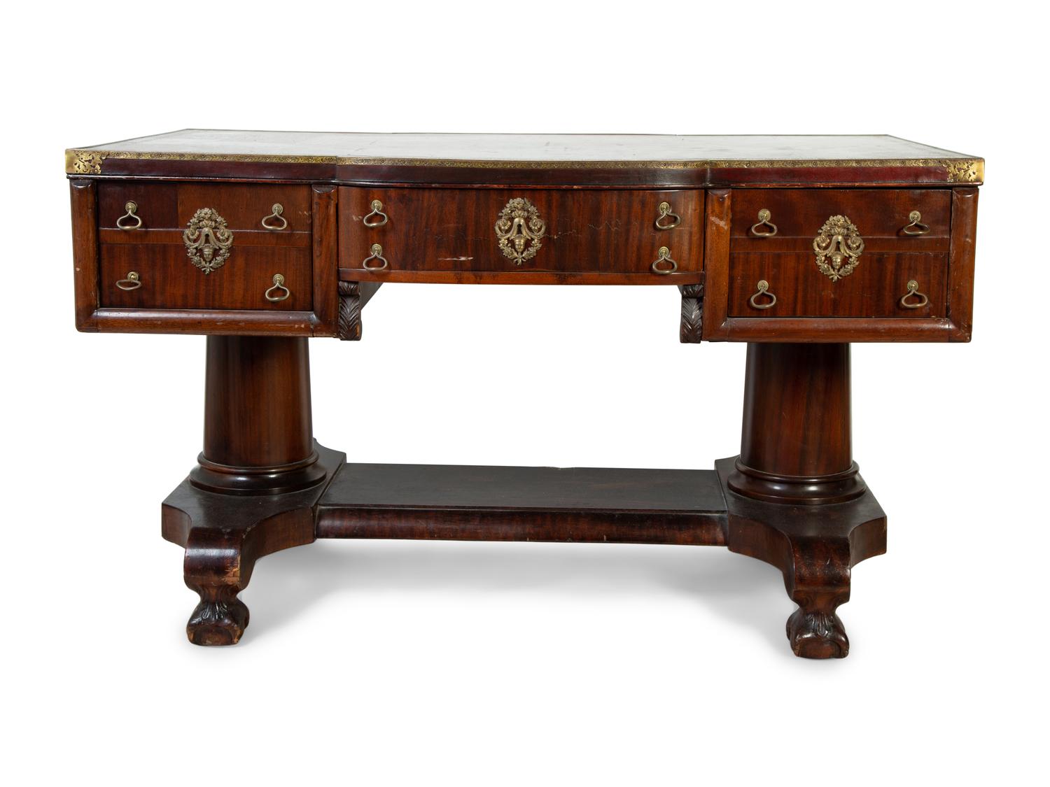 A Late Regency Style Mahogany Partner's Desk — 19TH CENTURY