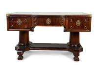 A Late Regency Style Mahogany Partner's Desk — 19TH CENTURY