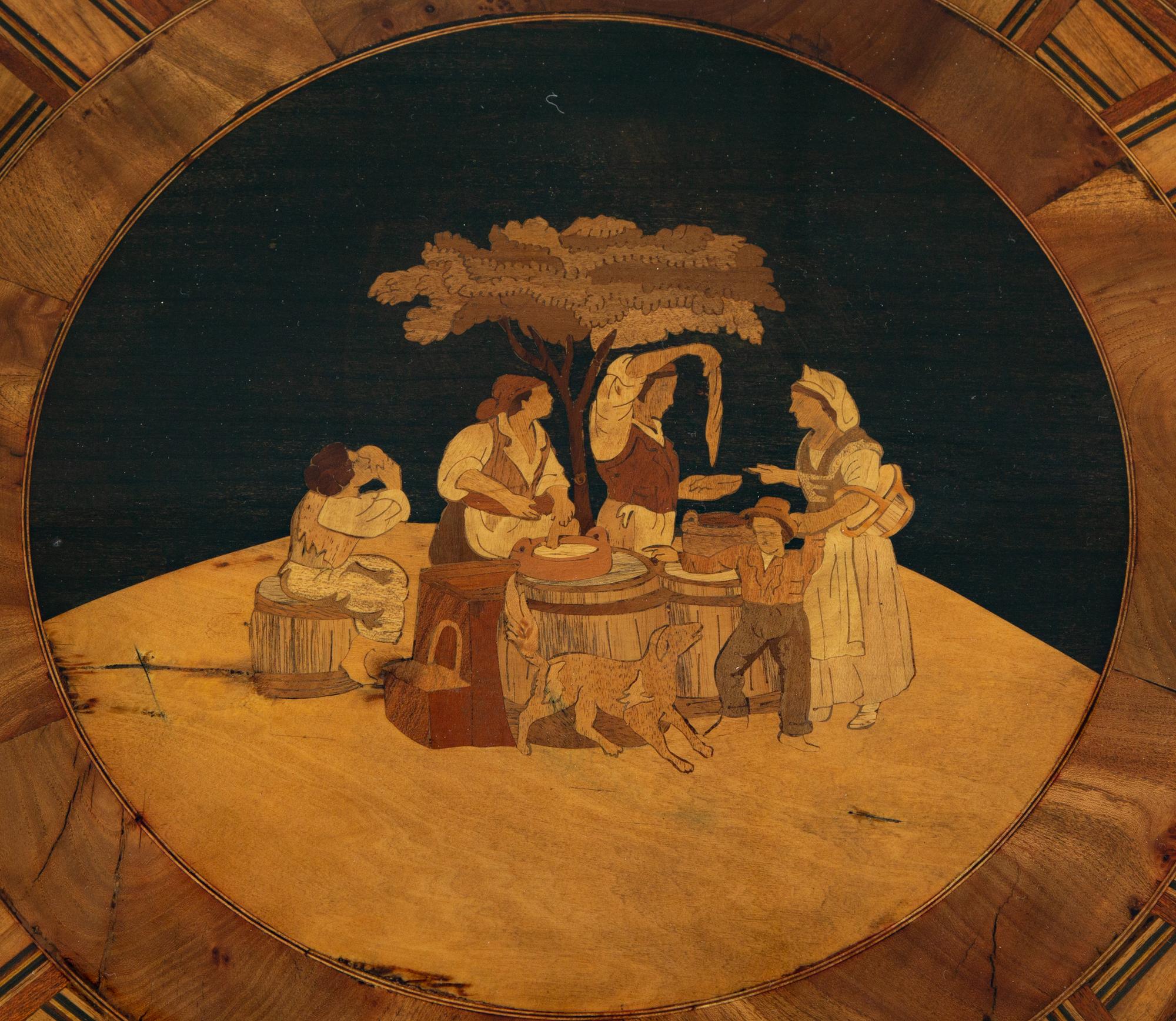 An Italian Walnut and Marquetry Tilt-Top Dining Table