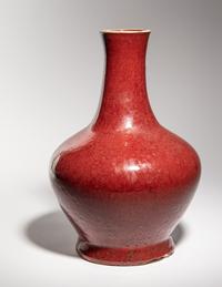 Two Sang-de-Boeuf Glazed Porcelain Bottle Vases