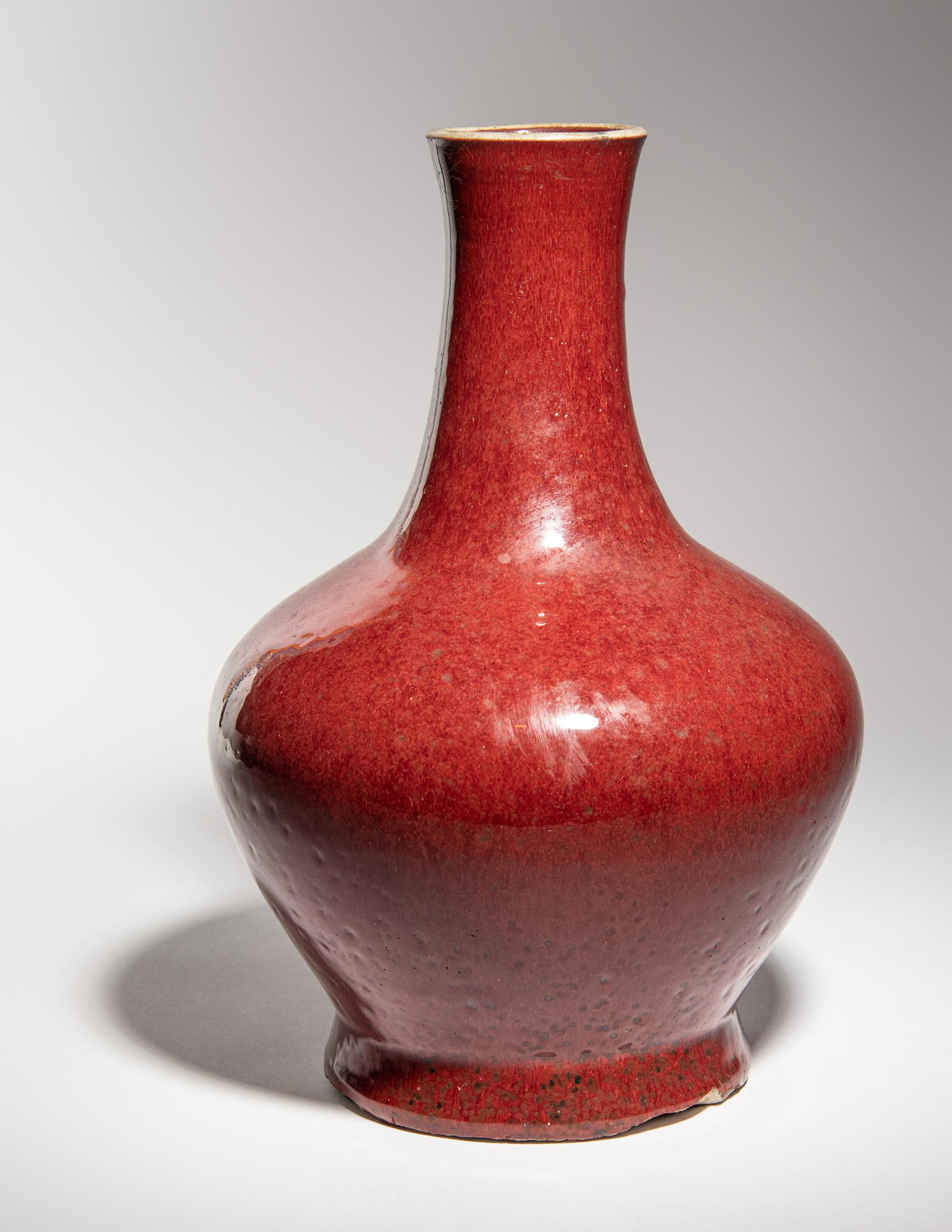Two Sang-de-Boeuf Glazed Porcelain Bottle Vases