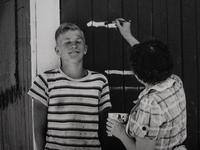 A group of five photographs from the Farm Families Project