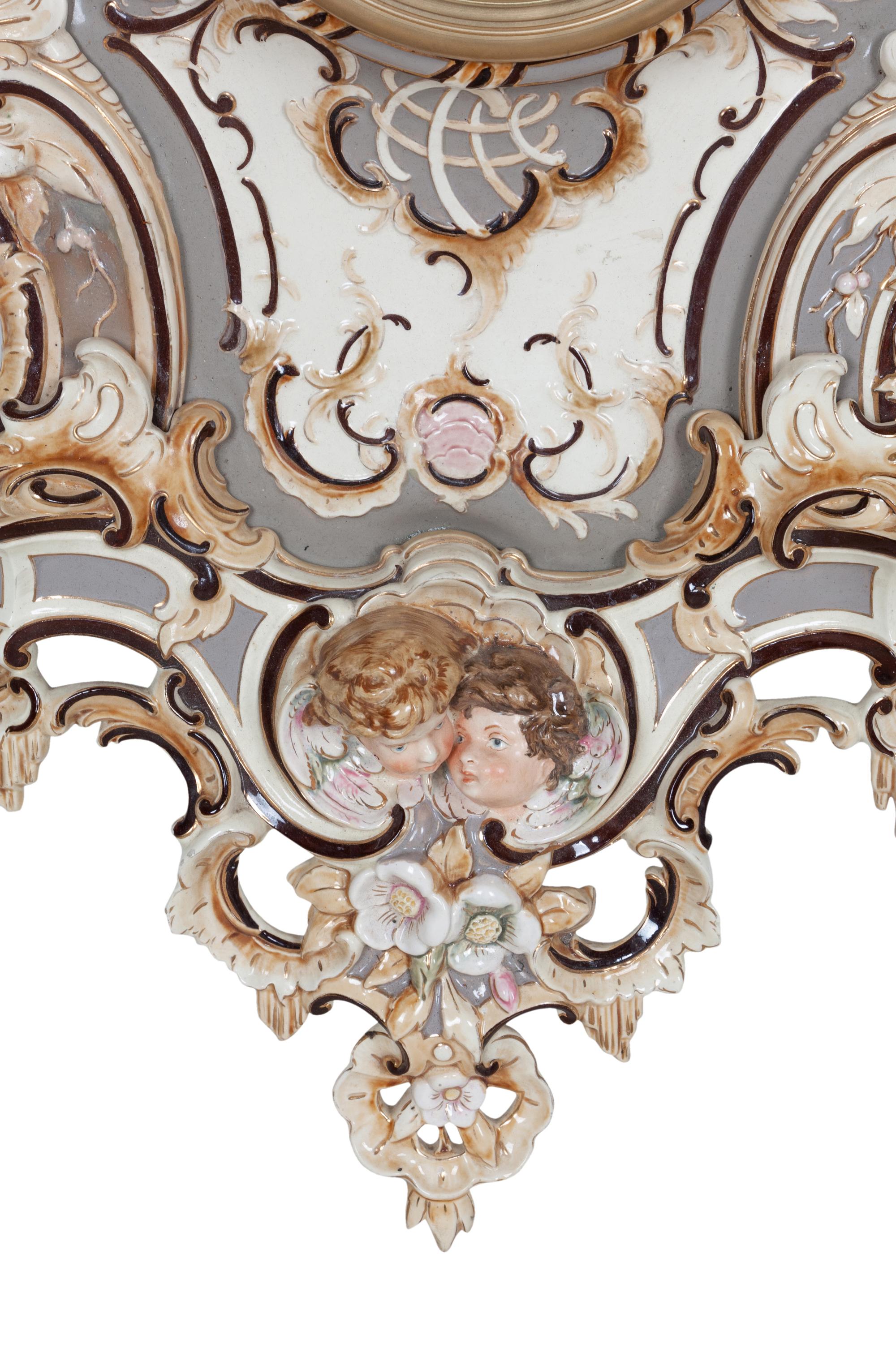 A Continental Majolica Wall Clock