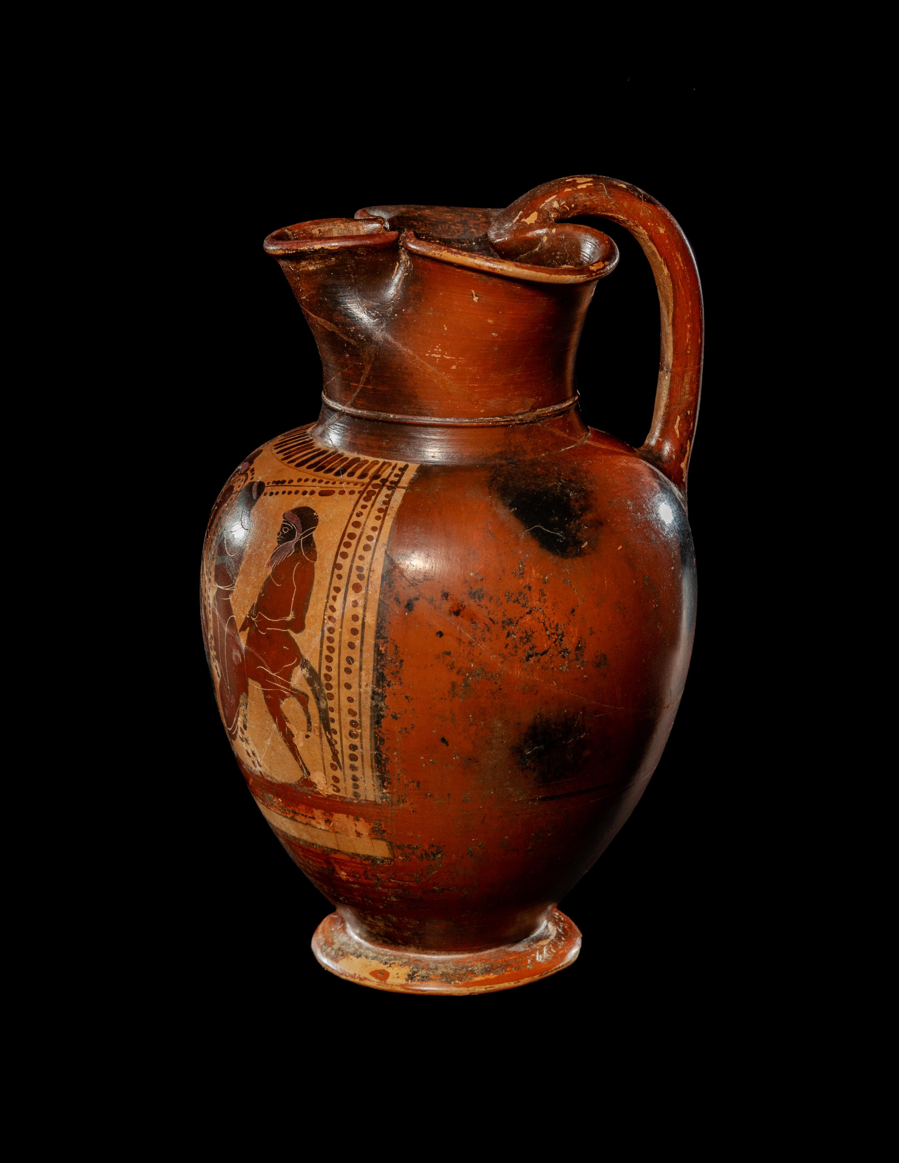 An Attic Black Figured Trefoil Oinochoe