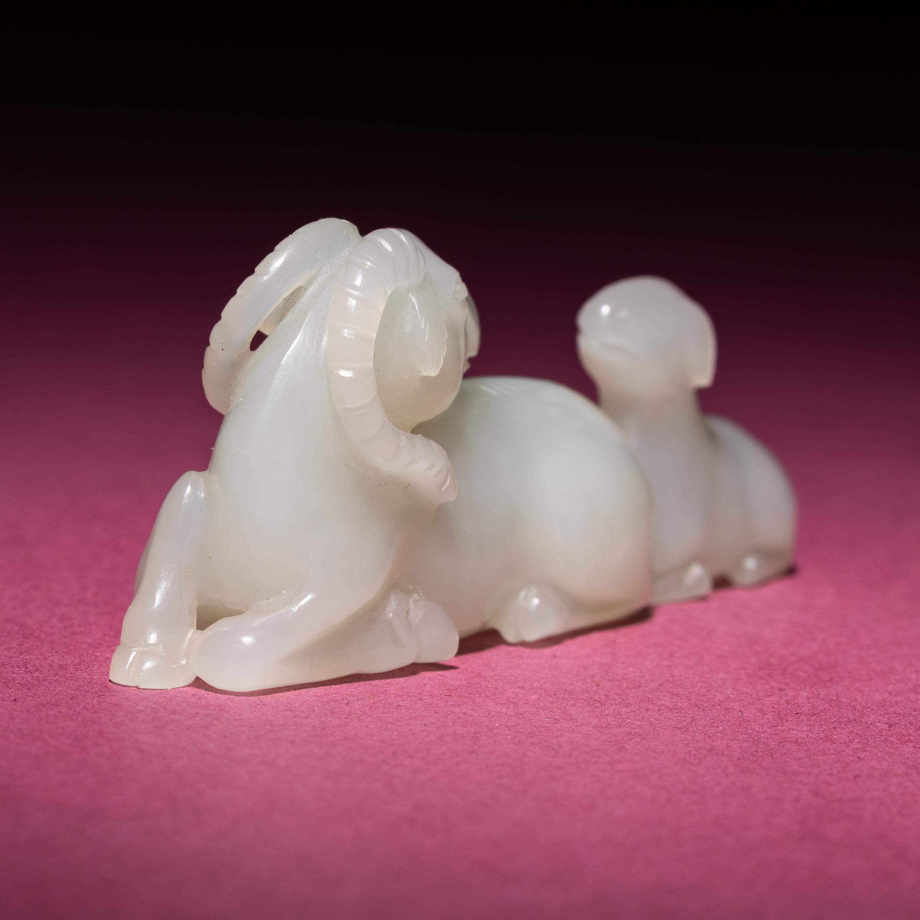 A Chinese White Jade 'Rams' Group, 18th/19th Century — 清中期 白玉雙羊把件