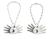 A Pair Sterling Silver and Turquoise Crossed Hands Necklaces, 116.00 dwts.