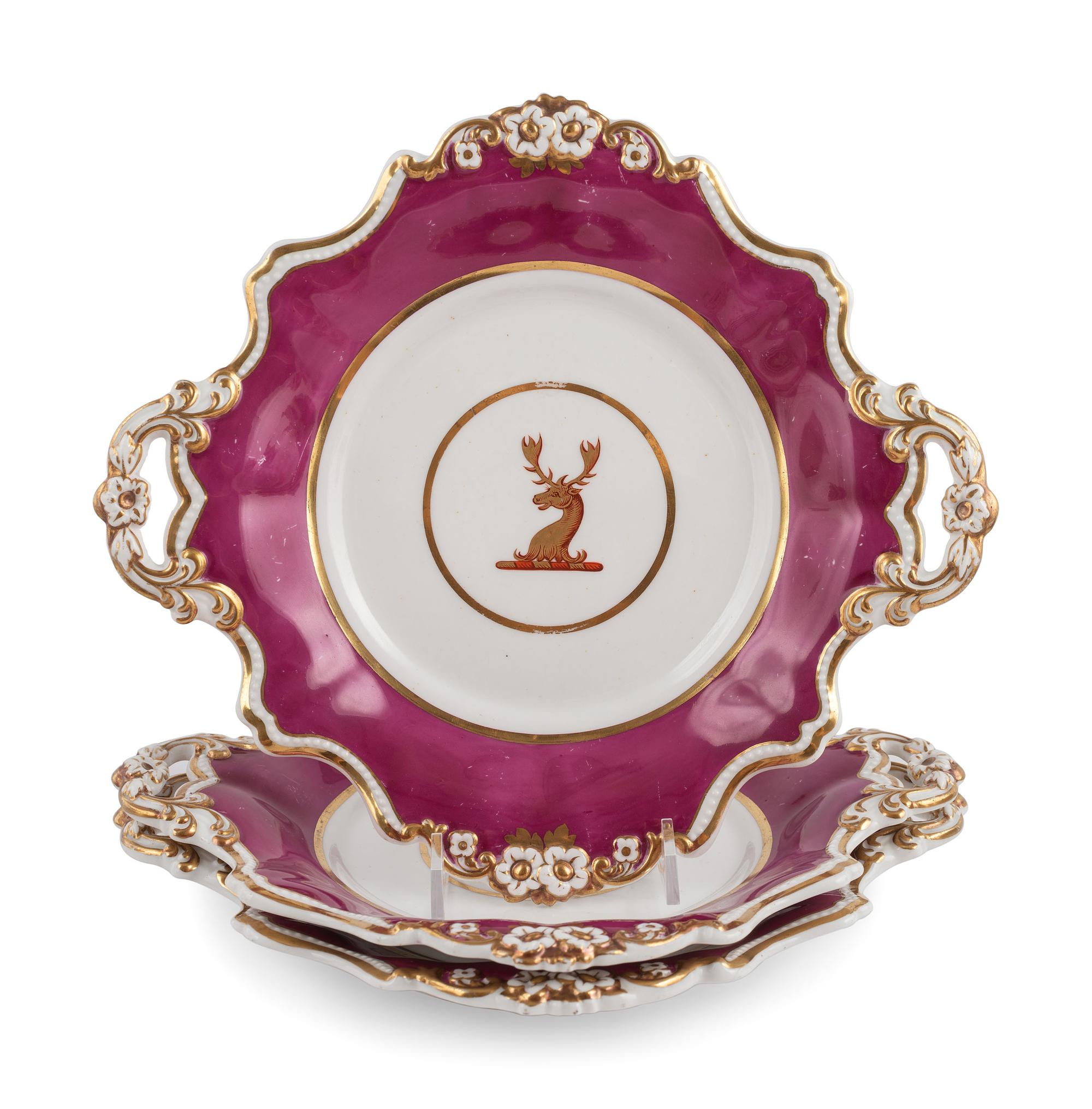An English Parcel-Gilt and Puce Decorated Porcelain Dinner Service