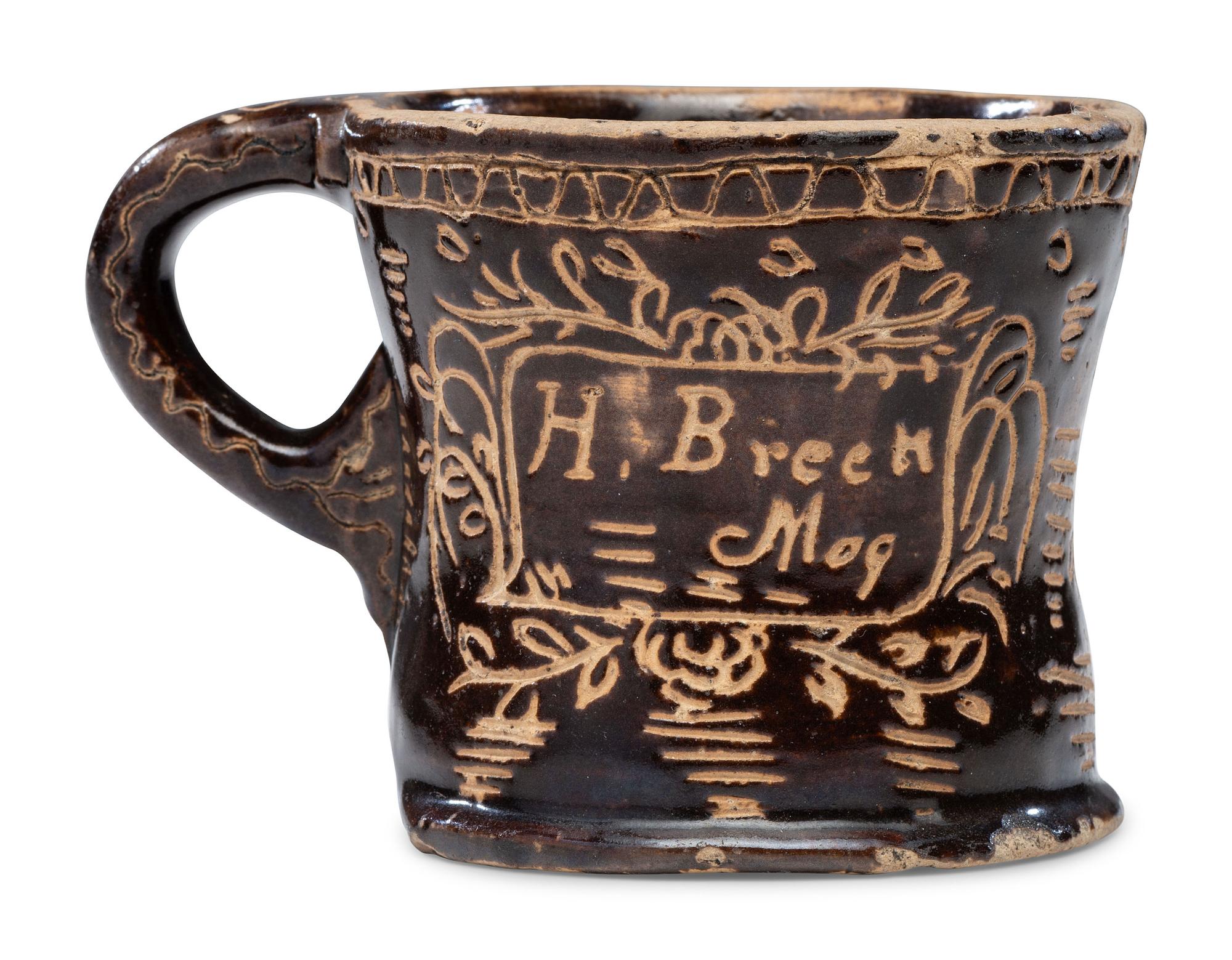 A Slip-Glazed and Incised Mug