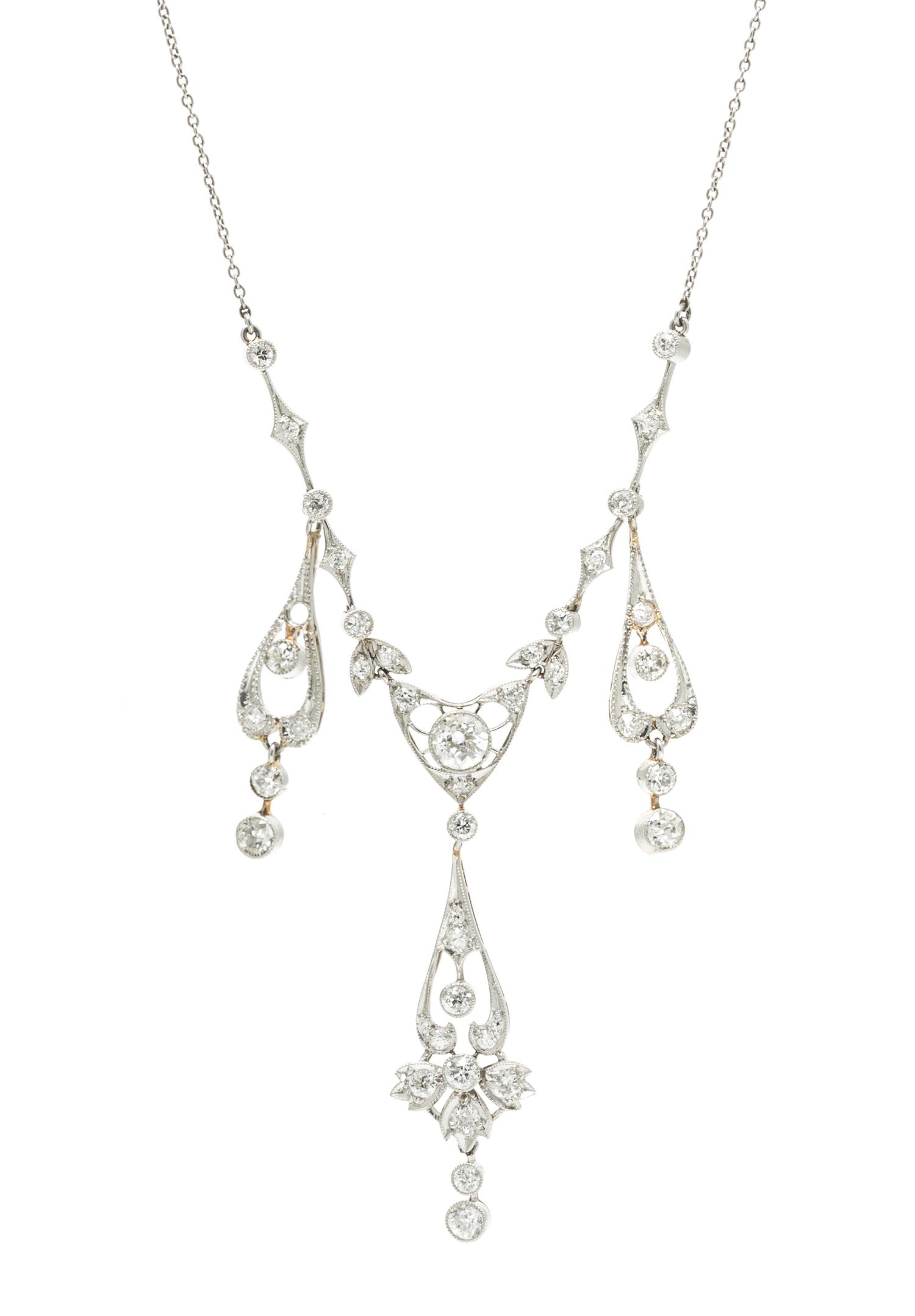 An Edwardian Platinum and Diamond Necklace, 7.70 dwts.