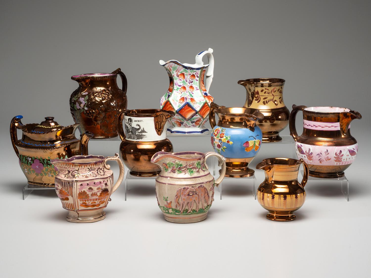 Twenty Lusterware Pitchers and Creamers