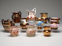 Twenty Lusterware Pitchers and Creamers