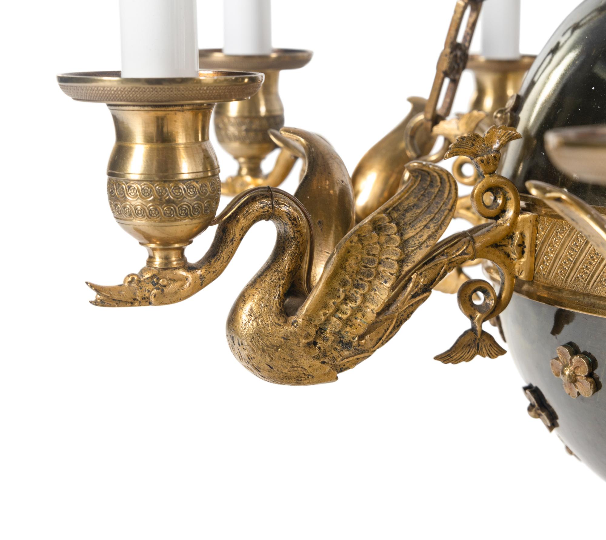 An Empire Style Gilt Bronze and Tole Chandelier