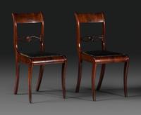 A Pair of Classical Figured and Carved Mahogany Klismos Side Chairs