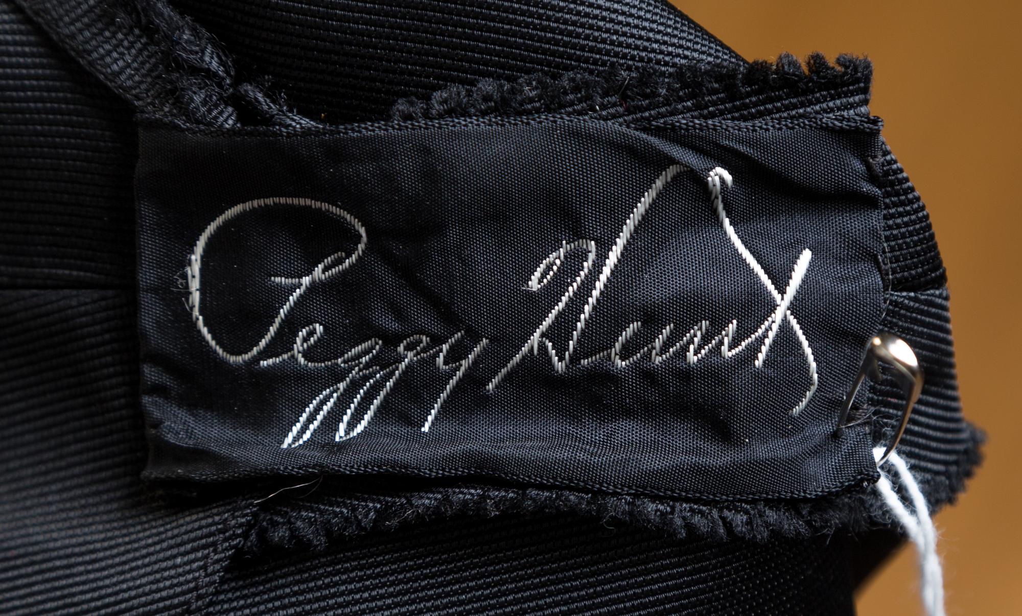 A Peggy Hunt Black Silk Cocktail Dress, No size.