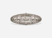 An Edwardian Diamond Brooch and Necklace