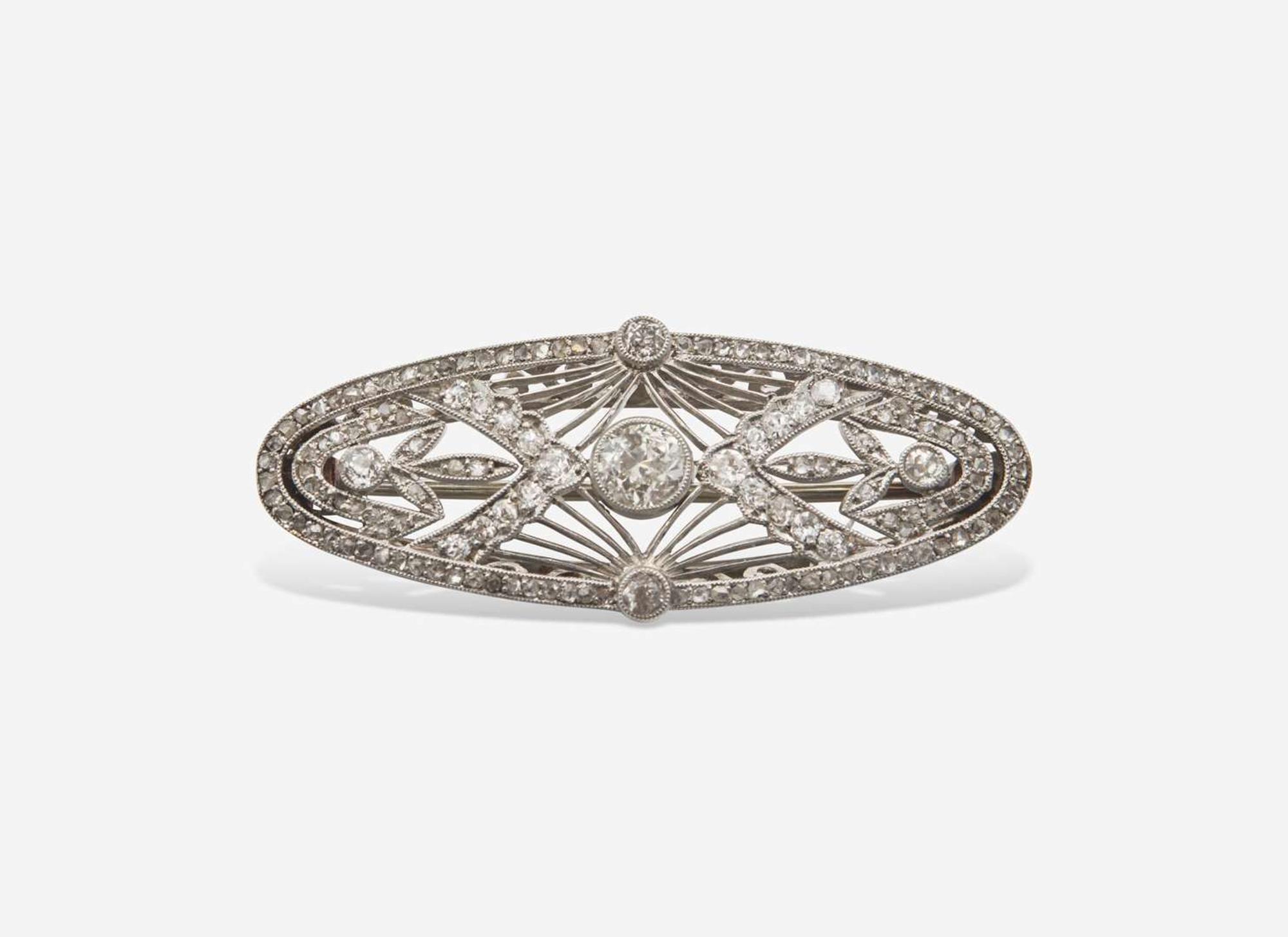 An Edwardian Diamond Brooch and Necklace