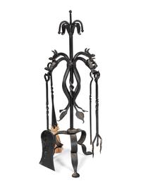 A Set of Iron Dragon Form Fireplace Tools